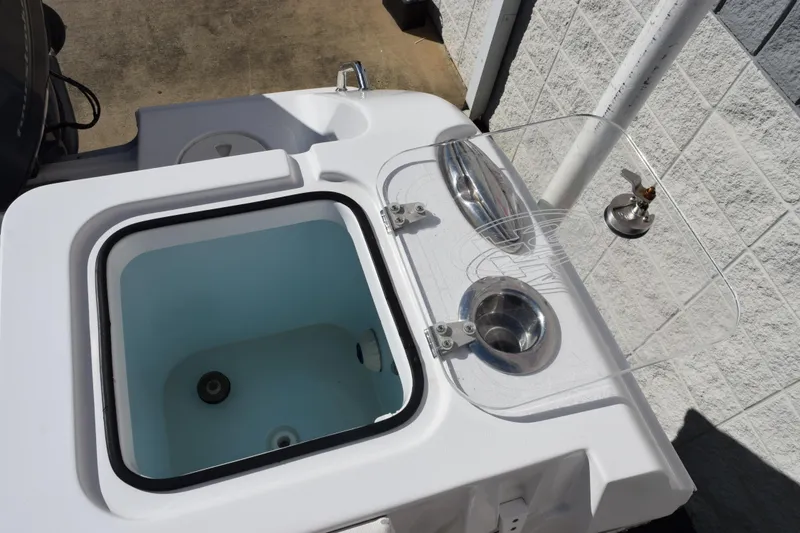 Slide: The Image of 2020 Sea Hunt Gamefish 27 boat livewell and sink setup, featuring forward seating. - 28