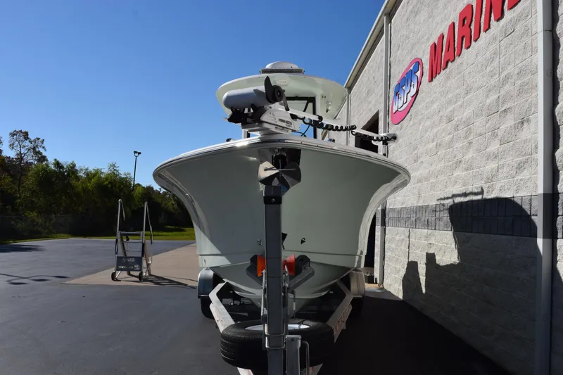 Slide: The Image of 2020 Sea Hunt Gamefish 27 boat on trailer outside marine store. - 3