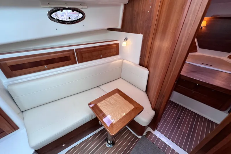 Slide: The Image of Luxurious interior of 2024 Back Cove 39O yacht with elegant wood and leather seating. - 37
