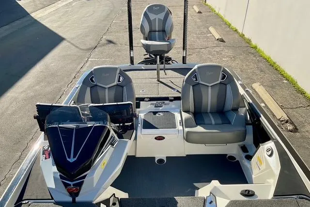 Slide: The Image of 2023 Ranger Z520R Ranger Cup Equipped boat interior with three seats and modern dashboard. - 13
