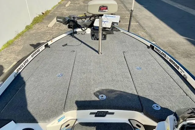 Slide: The Image of 2023 Ranger Z520R Ranger Cup Equipped boat deck with fishing gear and seating. - 16