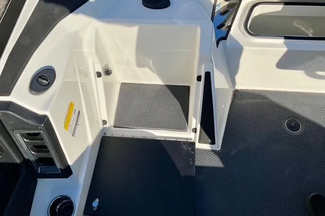 Slide: The Image of 2023 Ranger Z520R Ranger Cup Equipped boat interior with non-slip flooring and storage compartments. - 24