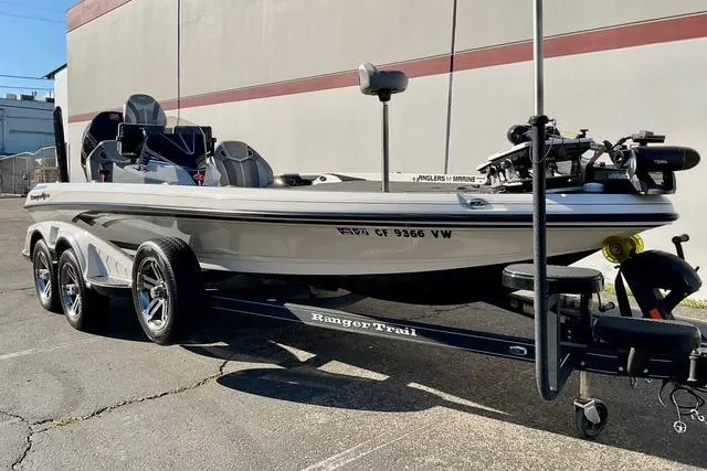 Slide: The Image of 2023 Ranger Z520R Ranger Cup Equipped boat on trailer, parked outdoors. - 3