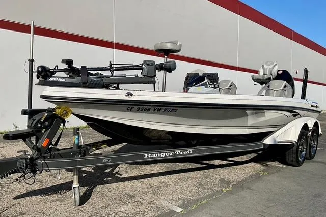 Slide: The Image of 2023 Ranger Z520R Ranger Cup Equipped boat on trailer, parked outdoors. - 6