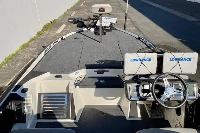 Slide: The Image of 2023 Ranger Z520R boat interior with Lowrance electronics and steering wheel. - 8