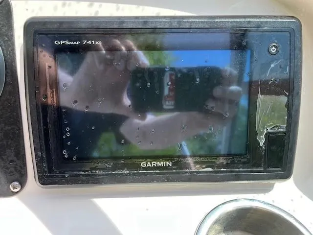Slide: The Image of Garmin GPSmap 741xs on 2017 Robalo R207 Dual Console boat dashboard. - 13