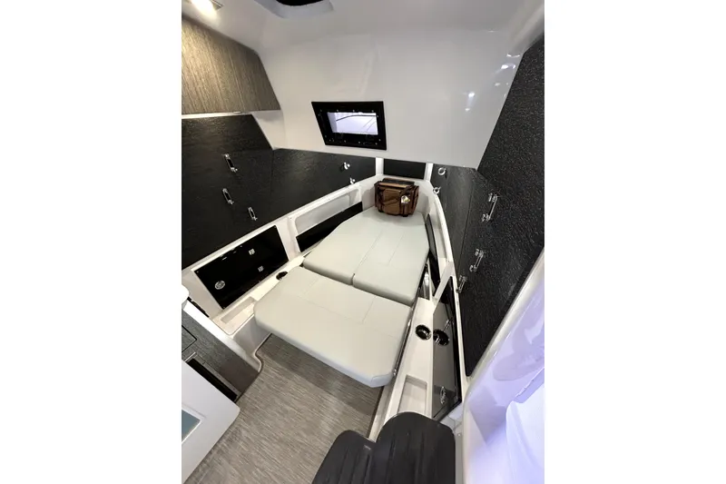 Slide: The Image of 2026 Blackfin 400 CC cabin interior with modern design and comfortable seating. - 10