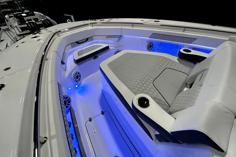 Slide: The Image of Luxurious interior of 2026 Blackfin 400 CC boat with blue LED lighting. - 14