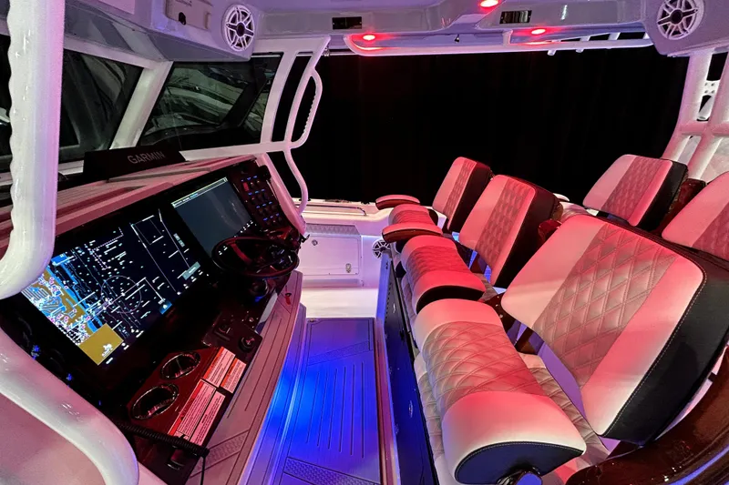 Slide: The Image of Interior of 2026 Blackfin 400 CC boat with advanced navigation and luxurious seating. - 8