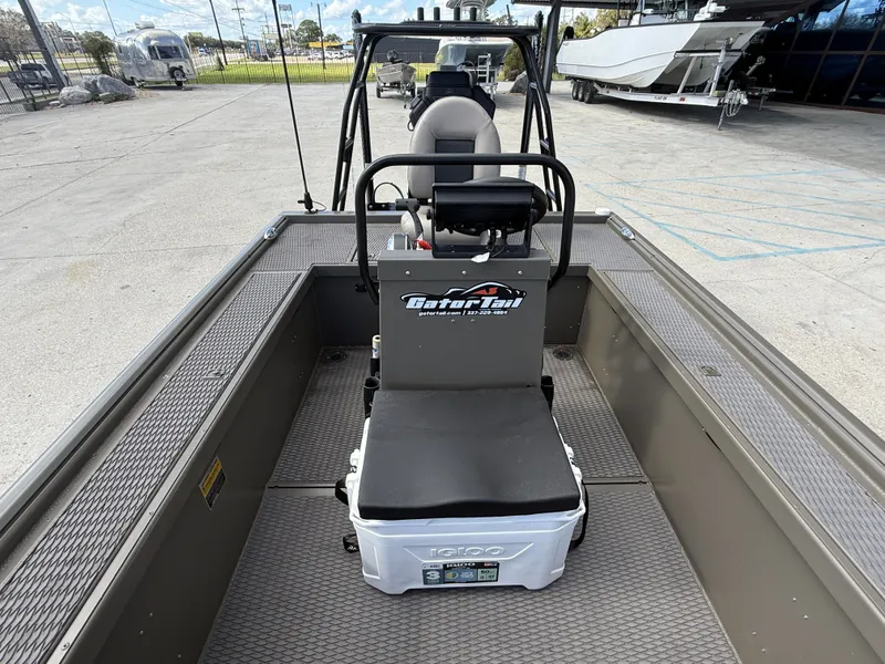 Slide: The Image of 2022 Gator Tail Extreme Series 1860CC boat interior with seating and storage. - 10