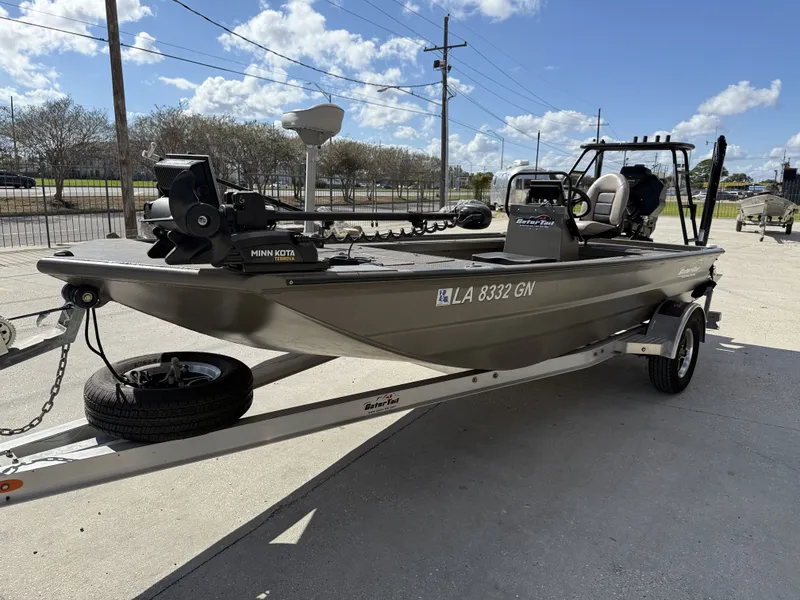 Slide: The Image of 2022 Gator Tail Extreme Series 1860CC boat on trailer, featuring Minn Kota motor. - 15