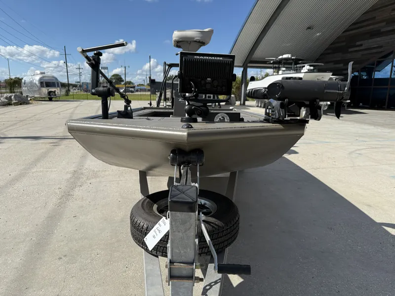 Slide: The Image of 2022 Gator Tail Extreme Series 1860CC boat on trailer, outdoor setting, clear sky. - 3