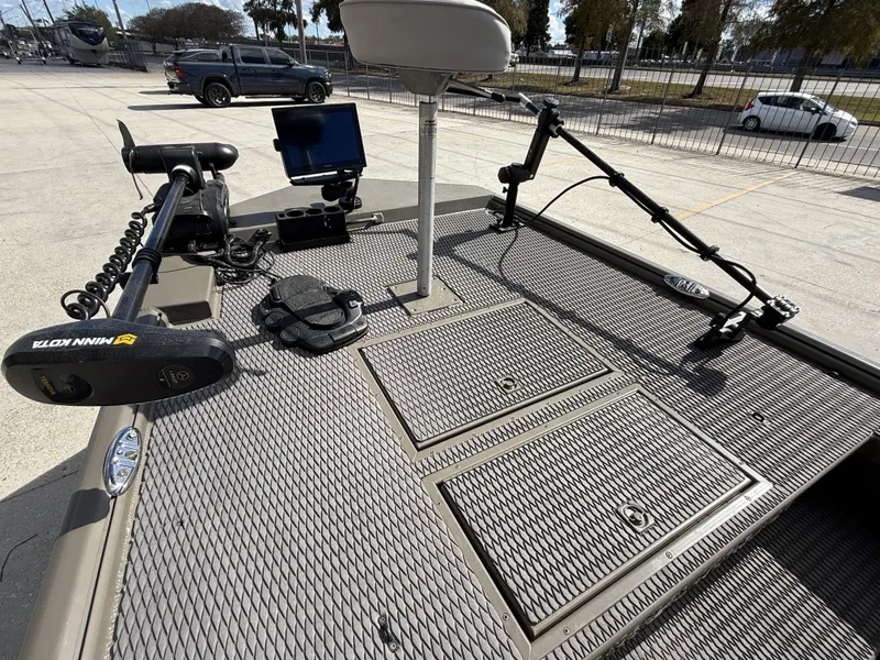 Slide: The Image of 2022 Gator Tail Extreme Series 1860CC boat deck with fishing equipment and electronics. - 5