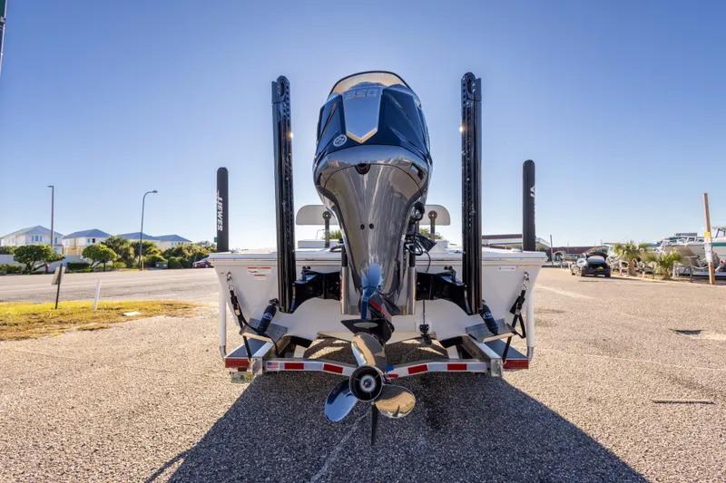 Slide: The Image of 2023 Hewes Redfisher 21 boat rear view with powerful outboard motor. - 11