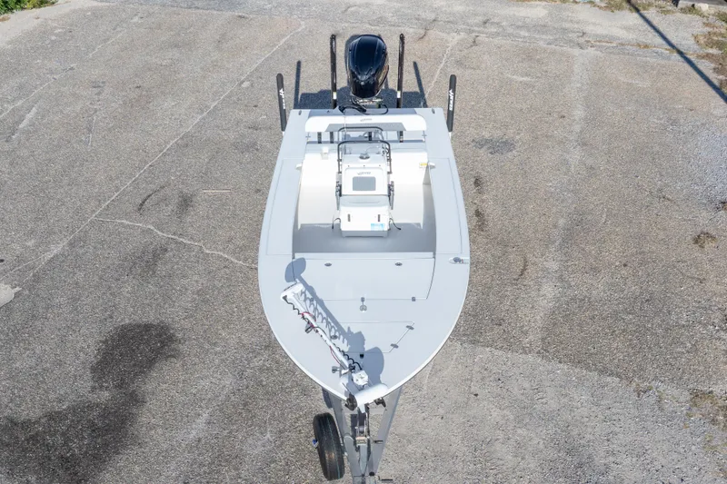 Slide: The Image of 2023 Hewes Redfisher 21 boat, aerial view, parked on concrete surface. - 14
