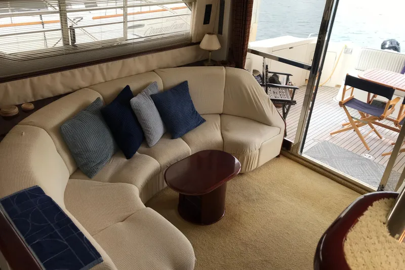Slide: The Image of Luxurious 1996 Princess yacht interior with cozy seating and elegant decor. - 6