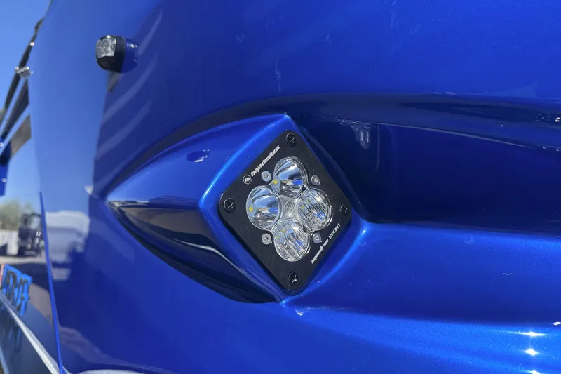 Slide: The Image of Close-up of blue 2025 Paradigm 27SST vehicle with LED light detail. - 11