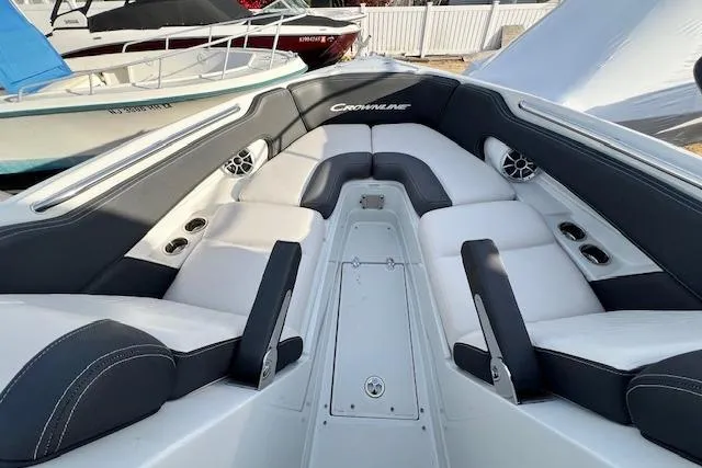 Slide: The Image of 2021 Crownline 265 SS boat interior with spacious seating and modern design. - 12