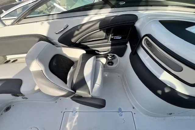 Slide: The Image of Interior of 2021 Crownline 265 SS boat, featuring sleek seating and modern design. - 9