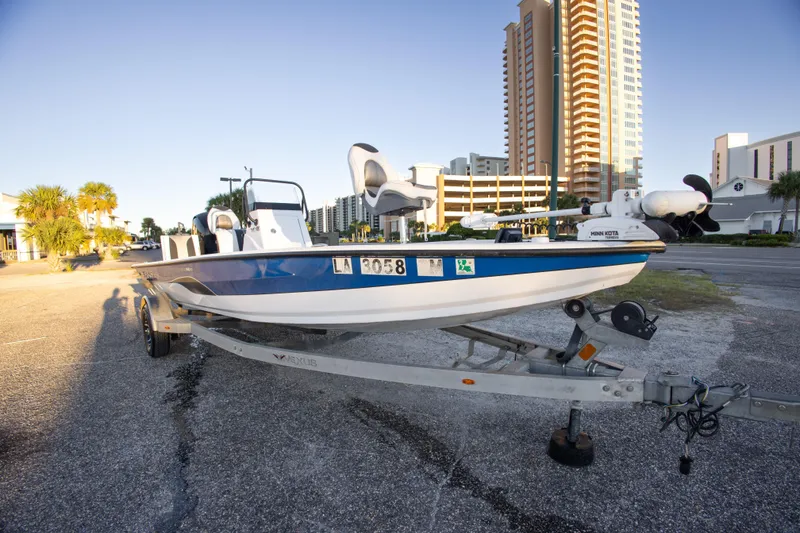 Slide: The Image of 2020 Vexus AVX1980CC boat on trailer, urban background, sunny day. - 8