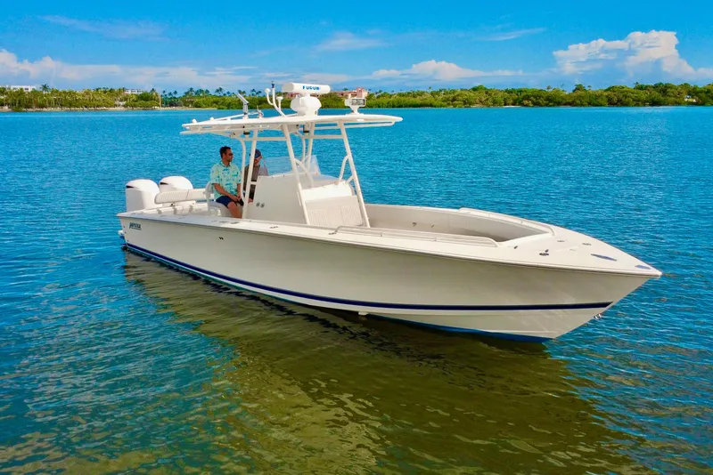 Slide: The Image of 2006 Jupiter 31FS boat on calm blue water under clear sky. - 11