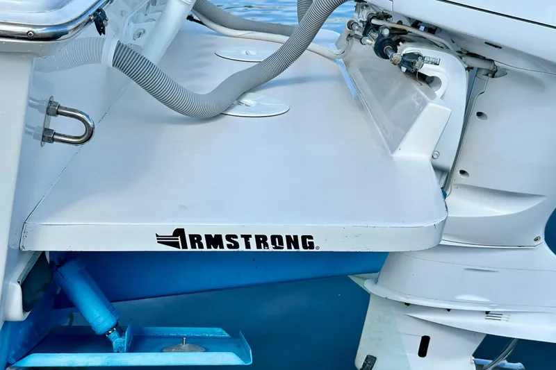 Slide: The Image of 2006 Jupiter 31FS boat with Armstrong bracket and outboard motor. - 17