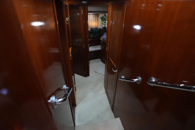 Slide: The Image of Interior of 2004 Carver 560 Voyager yacht with polished wood and elegant design. - 34
