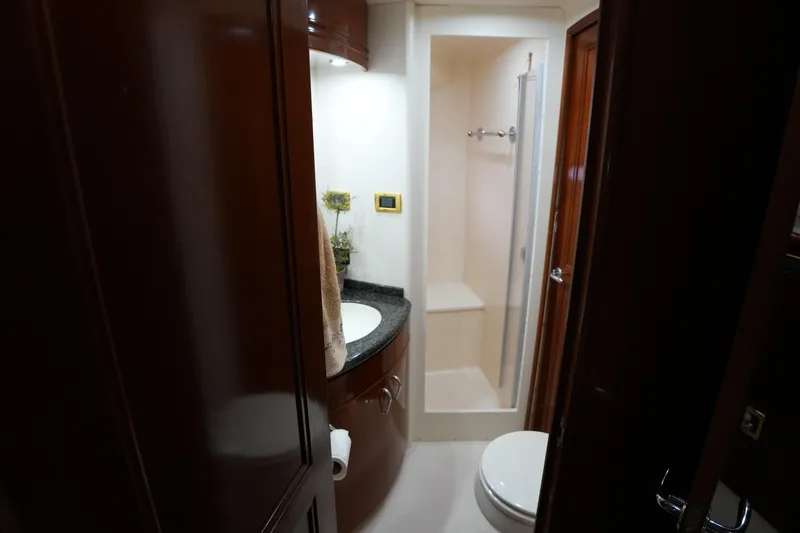 Slide: The Image of Luxurious bathroom in 2004 Carver 560 Voyager yacht with shower and vanity. - 37