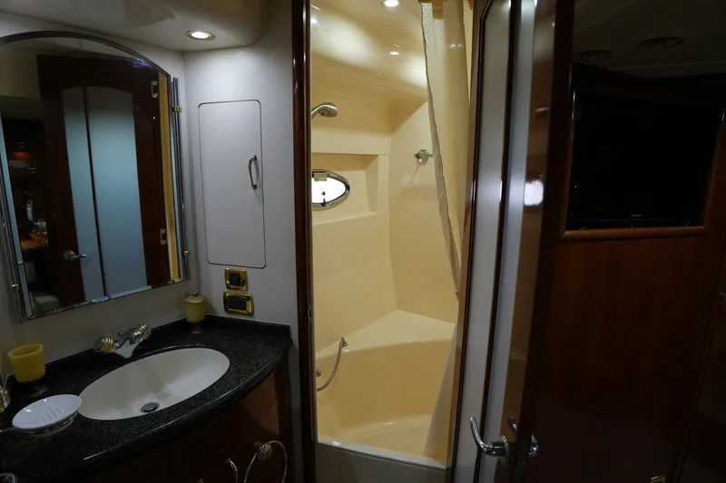 Slide: The Image of Luxurious bathroom interior of 2004 Carver 560 Voyager yacht with sink and shower. - 45