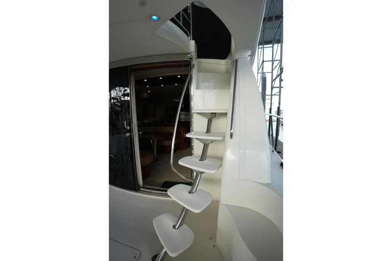 Slide: The Image of Staircase inside 2004 Carver 560 Voyager yacht, leading to upper deck. - 15