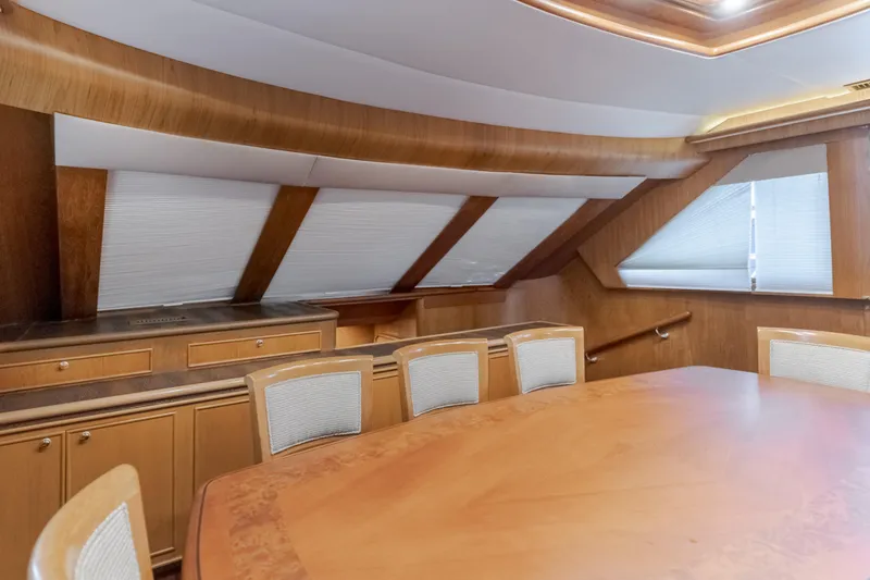 Slide: The Image of Luxurious 1997 Fobes Cooper Pilthouse yacht interior with elegant wood finishes and seating area. - 18
