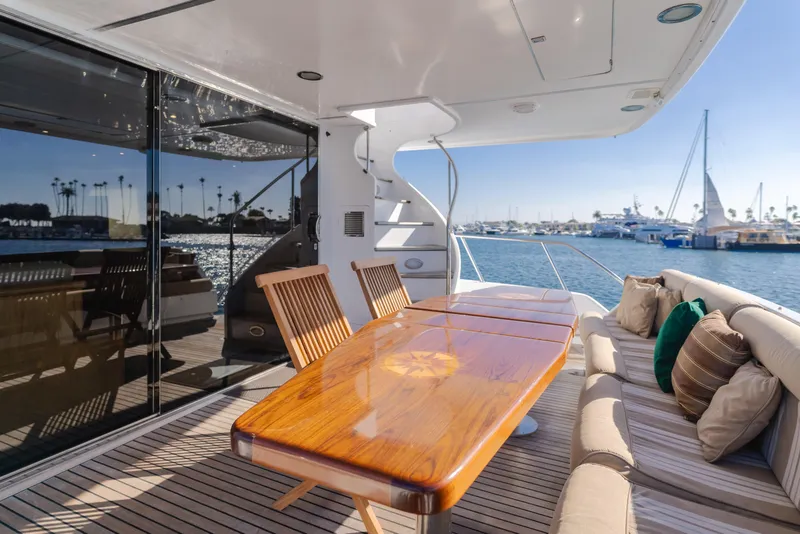 Slide: The Image of Luxurious 1997 Fobes Cooper Pilthouse yacht deck with elegant seating and ocean view. - 36