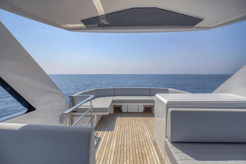 Slide: The Image of Luxury 2026 Astondoa AS5 yacht deck with ocean view and sleek seating. - 14