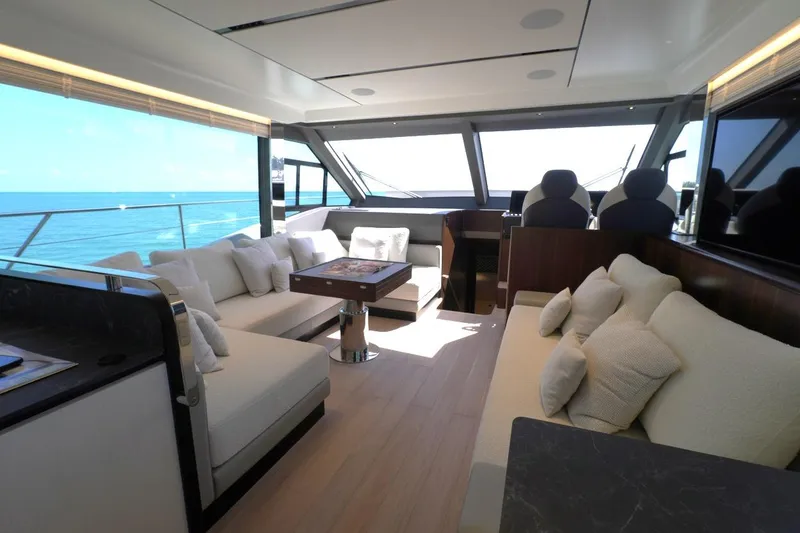 Slide: The Image of Luxurious interior of 2026 Astondoa AS5 yacht with ocean view and plush seating. - 17