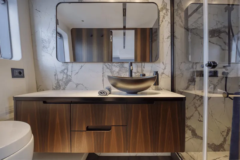 Slide: The Image of Luxurious bathroom in 2026 Astondoa AS5 yacht with marble walls and modern fixtures. - 22