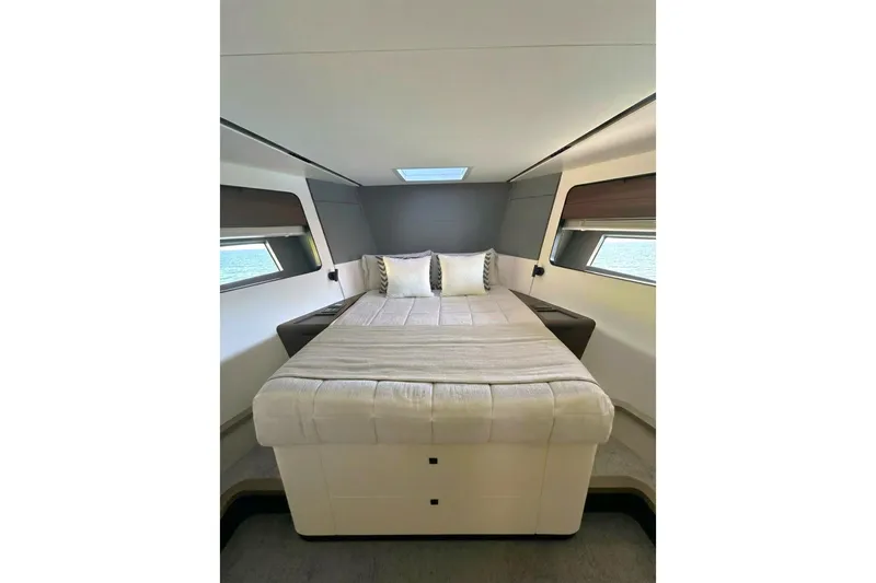Slide: The Image of Luxurious bedroom interior of 2026 Astondoa AS5 yacht with modern design and cozy bedding. - 23