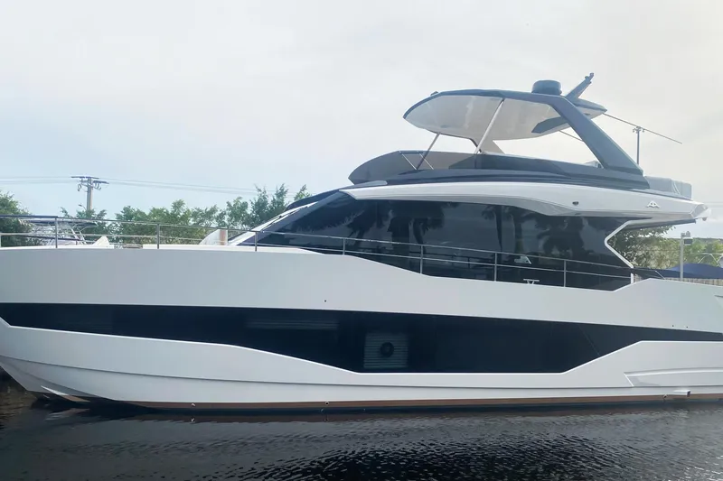 Slide: The Image of 2026 Astondoa AS5 yacht on water, sleek design, modern luxury vessel. - 5