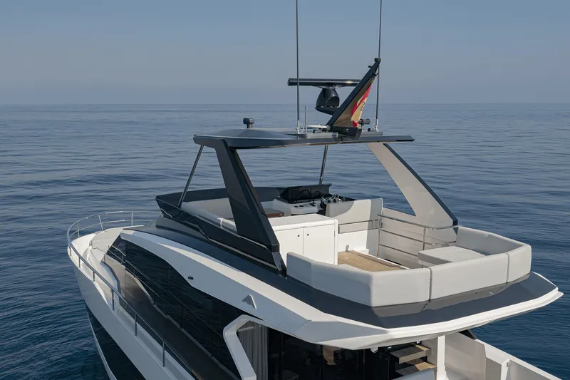 Slide: The Image of 2026 Astondoa AS5 yacht with sleek design on calm ocean waters. - 6