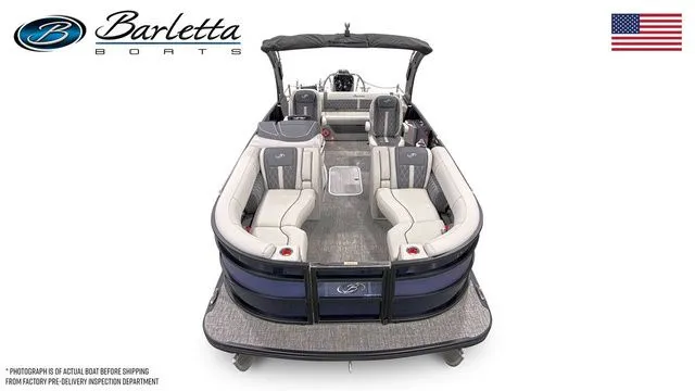 Slide: The Image of 2025 Barletta Boats L23UCA pontoon with luxurious seating and sleek design, featuring American flag. - 5