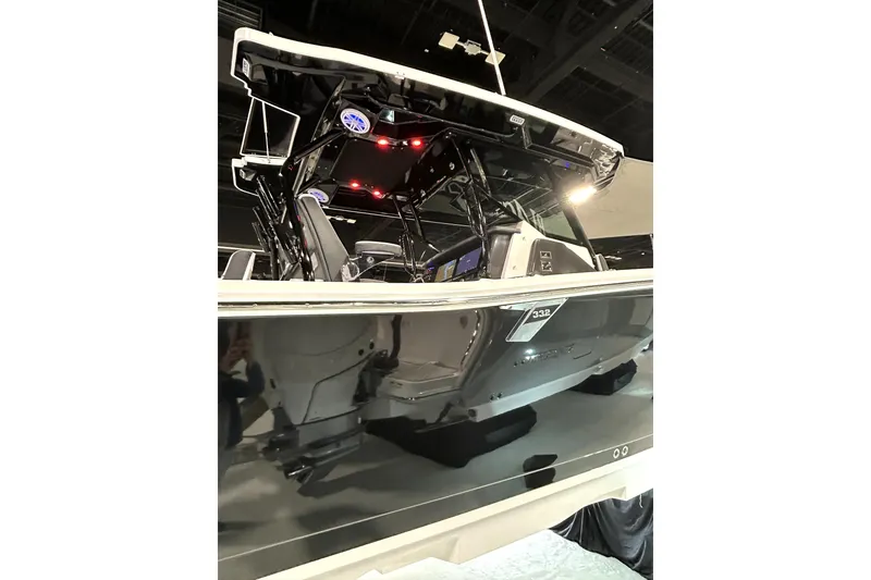 Slide: The Image of 2026 Blackfin 332 CC boat with sleek design and advanced features on display. - 1