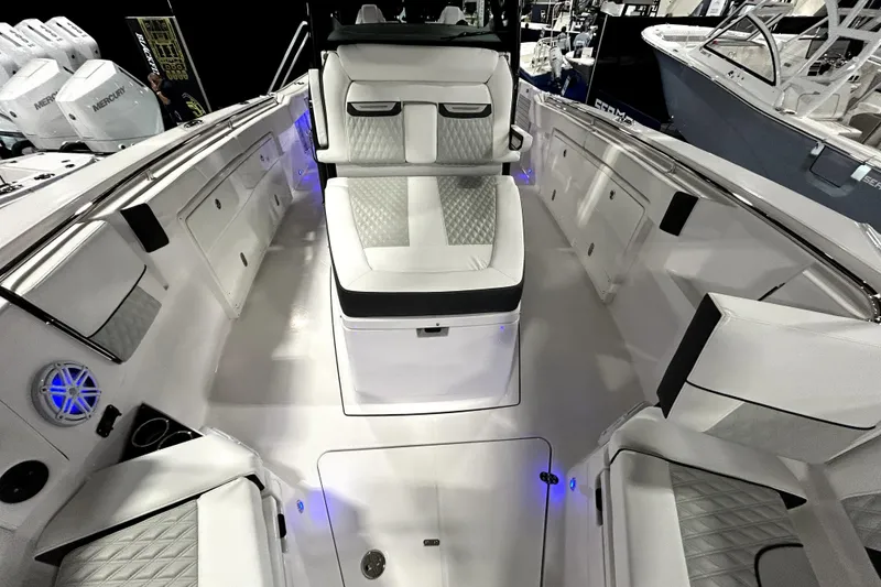 Slide: The Image of 2026 Blackfin 332 CC boat interior with luxurious seating and modern design. - 14