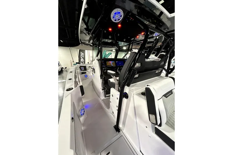 Slide: The Image of 2026 Blackfin 332 CC boat interior with modern seating and advanced controls. - 8