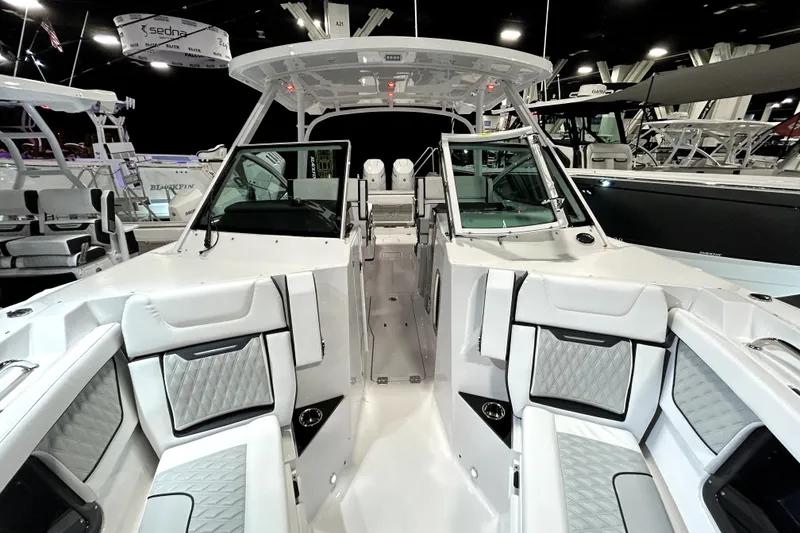 Slide: The Image of 2026 Blackfin 302 DC boat interior with luxurious seating and modern design. - 12