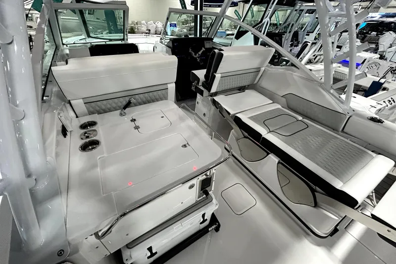 Slide: The Image of 2026 Blackfin 302 DC boat interior with sleek seating and modern design. - 17