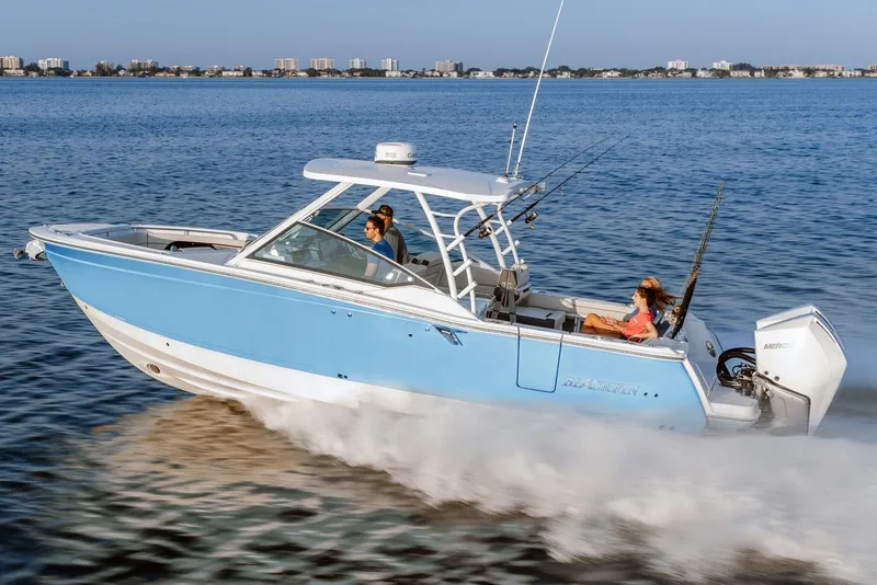 Slide: The Image of Manufacturer Provided Image: 2026 Blackfin 302 DC boat cruising on open water, showcasing sleek design and powerful performance. - 5