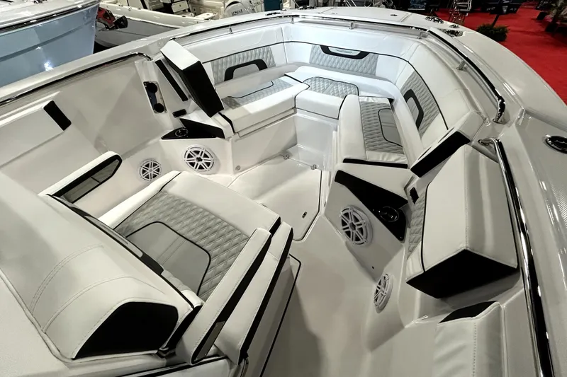 Slide: The Image of Luxurious interior of 2026 Blackfin 272 CC boat with plush seating and modern design. - 15