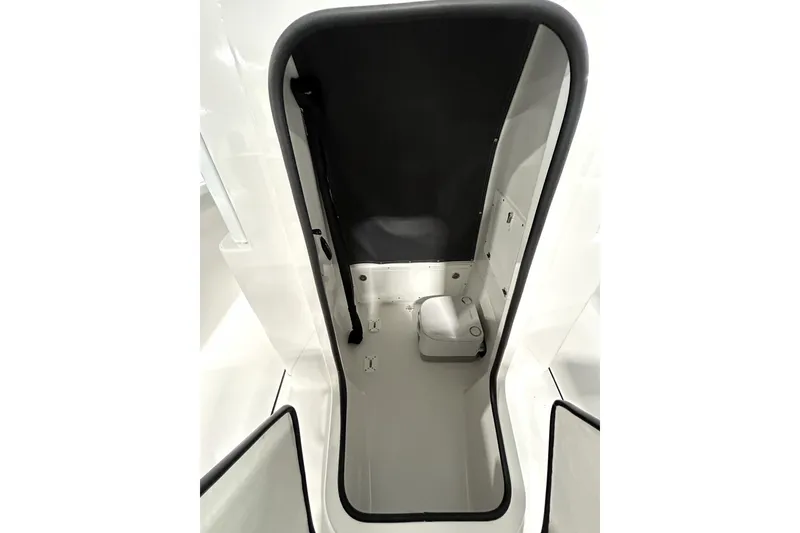 Slide: The Image of 2026 Blackfin 242 HB boat interior with compact toilet compartment. - 16