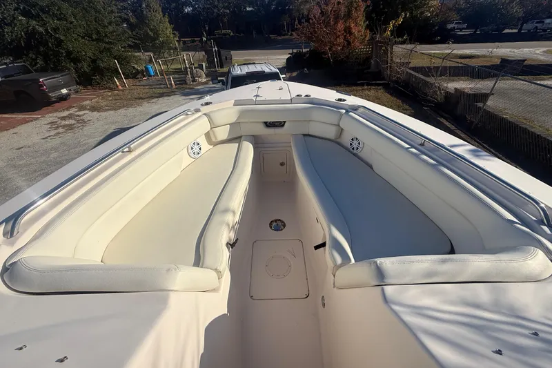 Slide: The Image of 2015 Grady-White Freedom 307 boat with spacious seating and sleek design. - 24