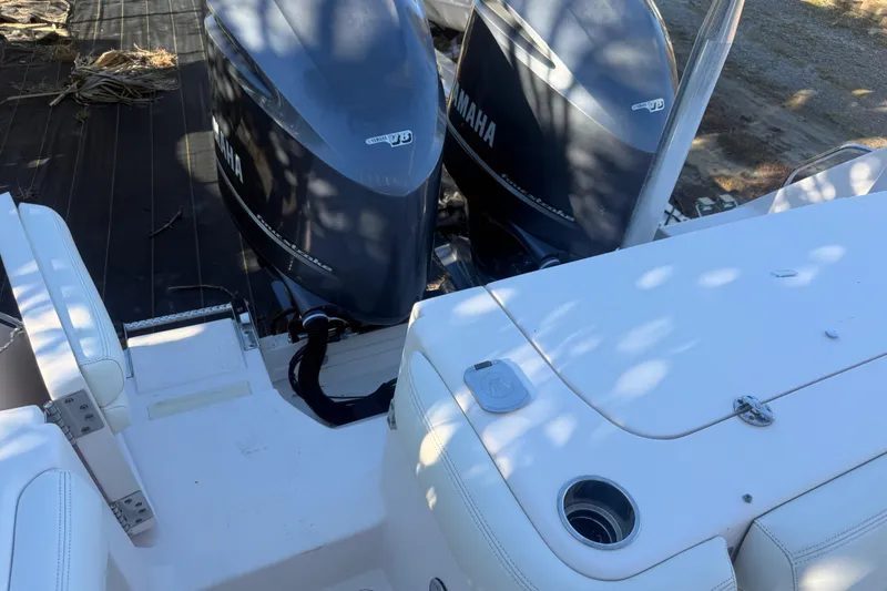 Slide: The Image of 2015 Grady-White Freedom 307 boat with twin Yamaha outboard engines. - 31