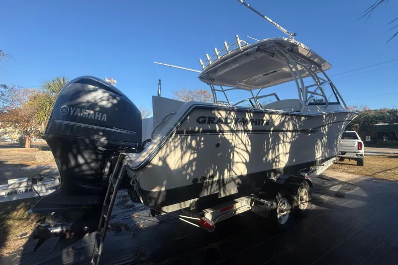 Slide: The Image of 2015 Grady-White Freedom 307 boat with Yamaha engine on trailer. - 6